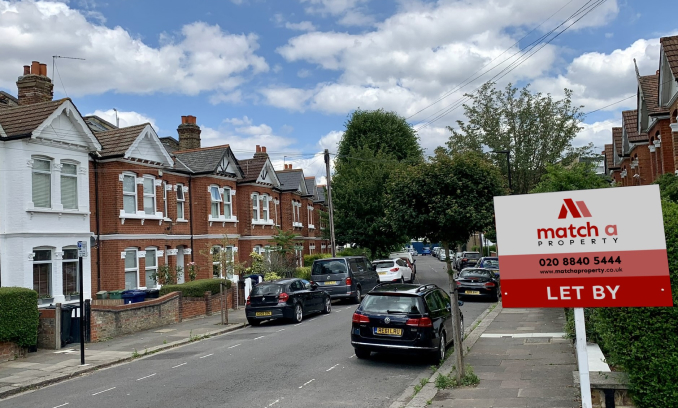 A house let with a Match a Property board outside it
