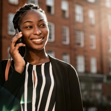 A person on the phone booking a valuation